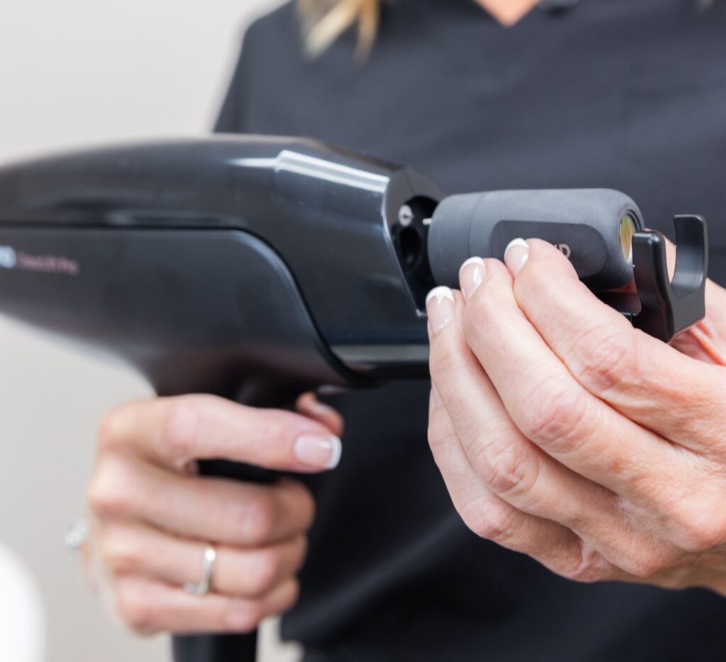 A skin doctor near me in Indianapolis, IN prepares an IPL treatment