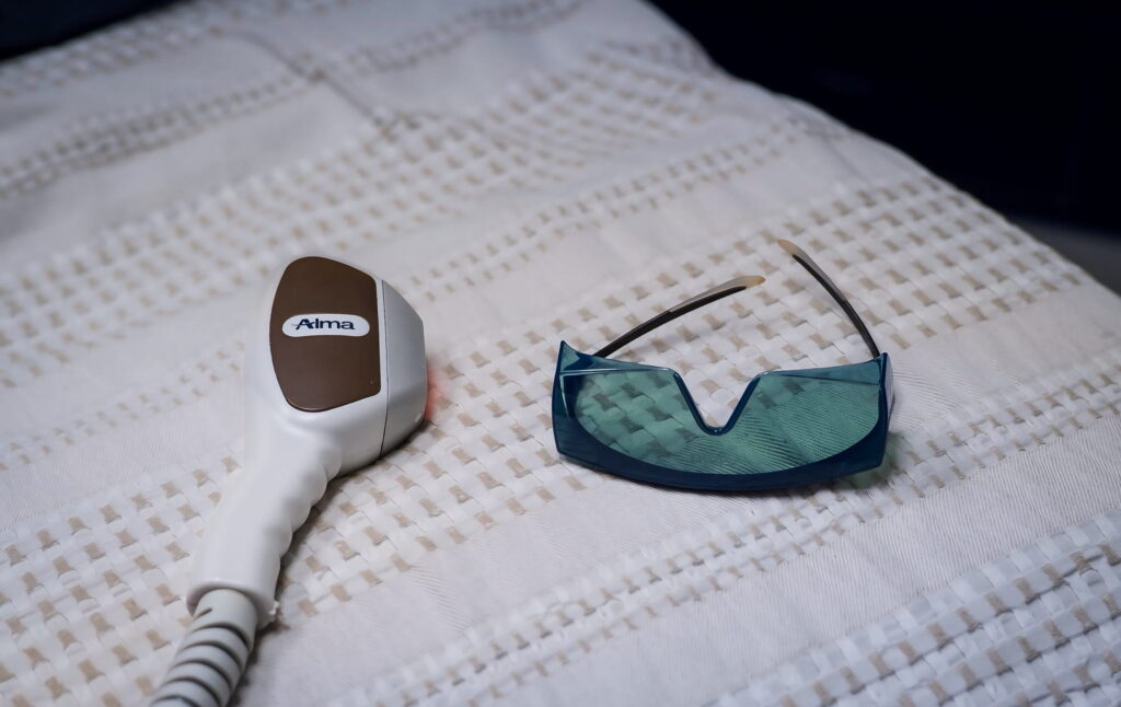 A close-up of goggles and an applicator of the hair reduction laser in Terre Haute